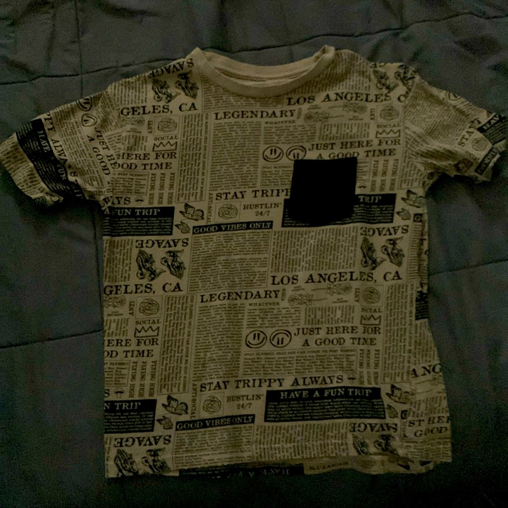 I am selling a T-shirt that is tan and it’s size 14 in boys